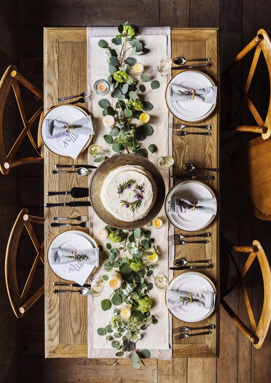 Elegant champagne glasses and seasonal decor for a festive gathering