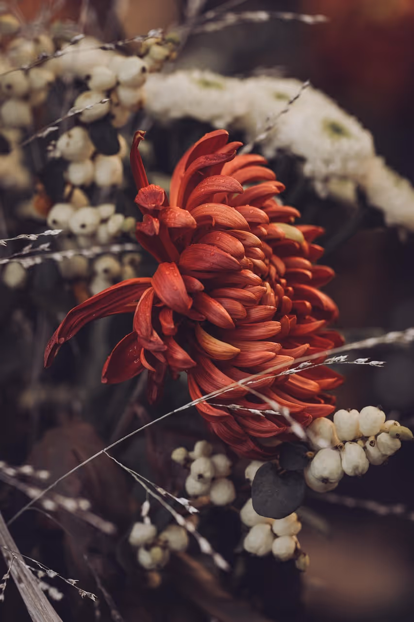 Fresh floral arrangement with white and green seasonal blooms